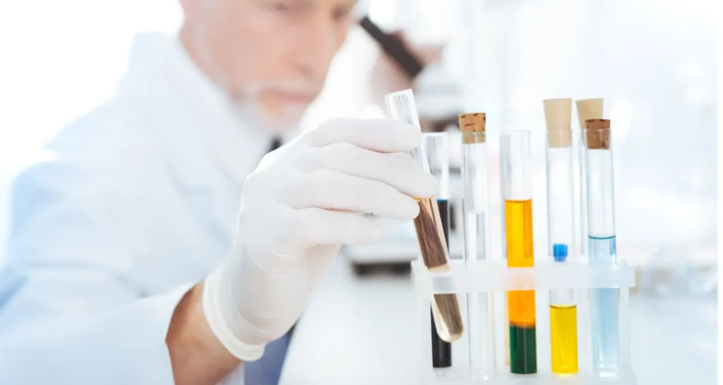 Scientist in a lab analyzing a hair sample for drug and alcohol content, demonstrating precision and expertise in forensic toxicology
