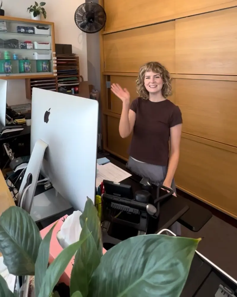 Friendly receptionist welcoming visitors to the hair drug testing clinic
